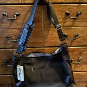 IHKWIP Shoulder Bag.  NWT.  19” across and 10” high.